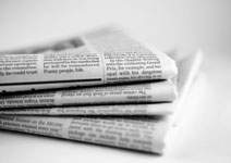 image of stacked newspapers